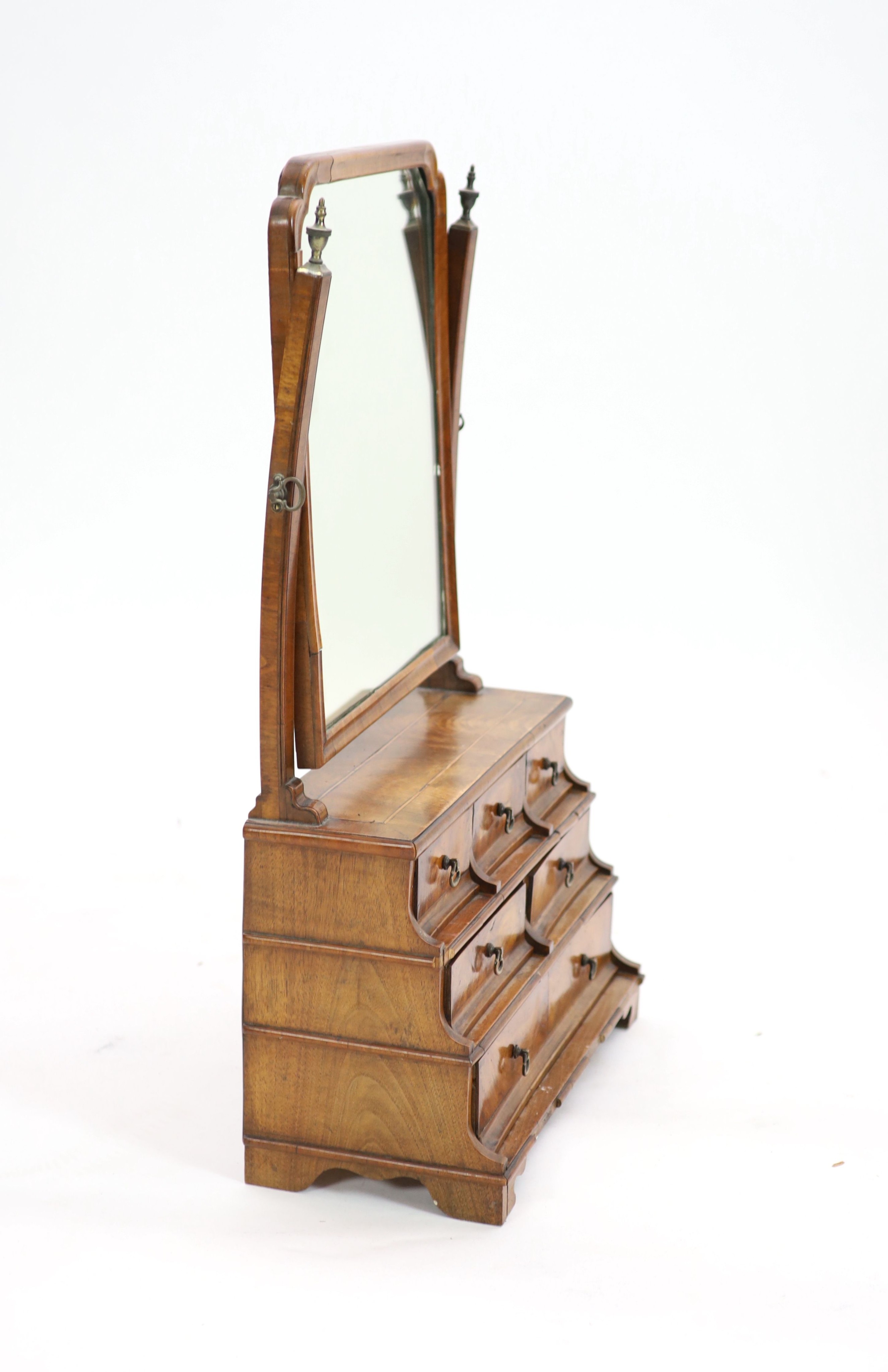 A Queen Anne walnut toilet mirror, W.46cm D.22cm H.77cm